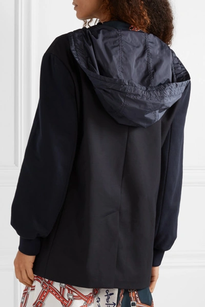 Shop Tibi Reversible Hooded Jersey And Shell-paneled Woven Blazer In Midnight Blue