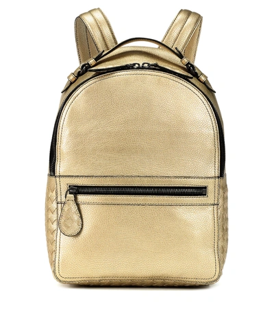 Shop Bottega Veneta Electre Metallic Leather Backpack In Gold