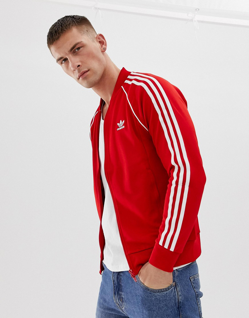 adidas originals adicolor three stripe track jacket in red