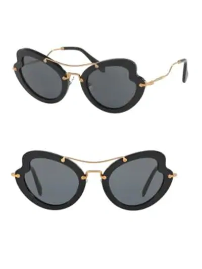 Shop Miu Miu 52mm Curved Cat Eye Sunglasses In Black