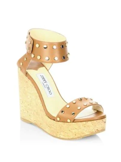 Shop Jimmy Choo Nellie Studded Leather Cork Wedge Sandals In Canyon