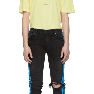 Shop Amiri Black Broken Track Jeans