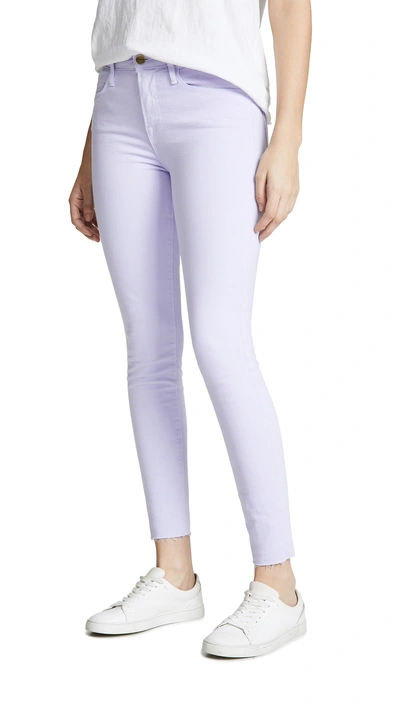 Shop Frame Le High Skinny Raw Edge Jeans In Lavender