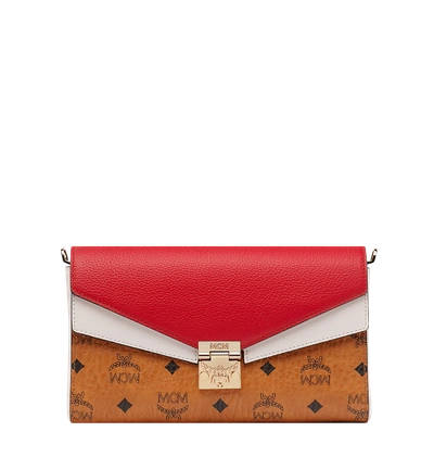 Shop Mcm Millie Flap Crossbody In Visetos Leather Block In Cognac & Ruby Red