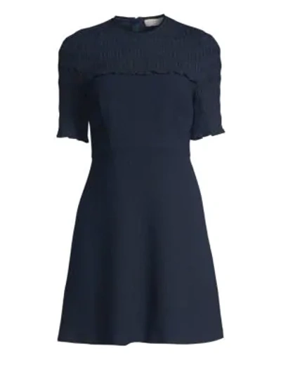 Shop Sandro Smocked Mini Dress In Deep Navy