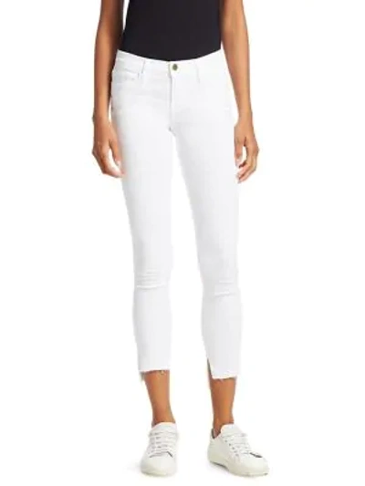 Shop Frame Stretch-cotton Mid-rise Ankle Skinny Jeans In Blanc