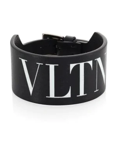 Shop Valentino Vltn Leather Bracelet In Black White