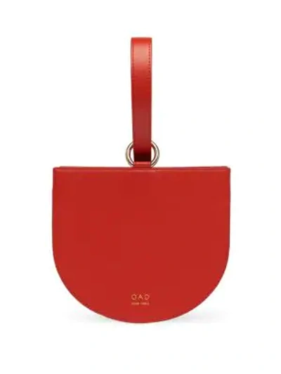 Shop Oad Dome Leather Wristlet In Rouge