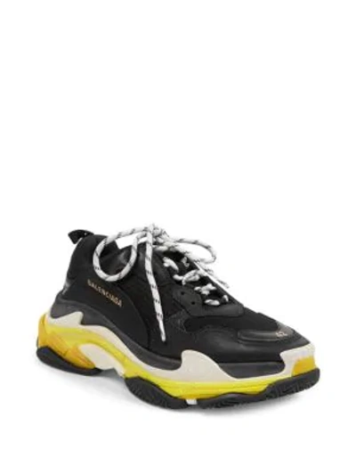 Shop Balenciaga Triple S Sneakers In Black Yellow