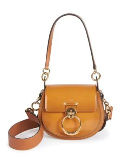 Shop Chloé Small Tess Patent Leather Saddle Bag In Brown