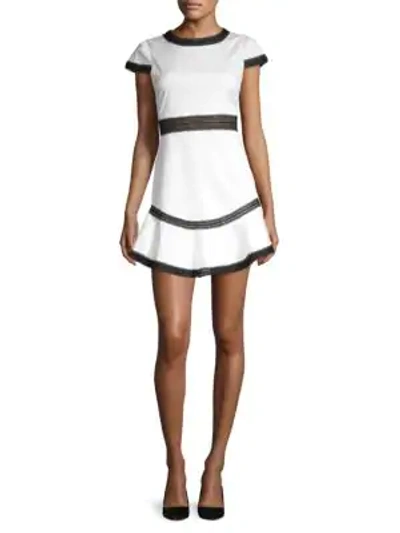 Shop Alice And Olivia Rapunzel Flounce Mini Dress In White Multi