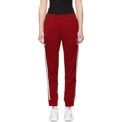 Shop Adidas Originals Red Sst Track Pants In Power Red