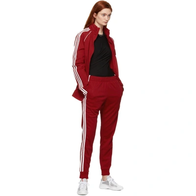 Shop Adidas Originals Red Sst Track Pants In Power Red