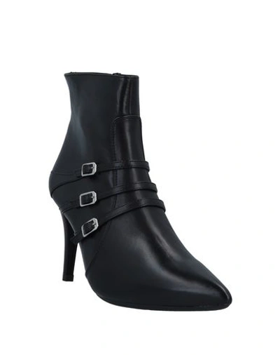 Shop Unisa Ankle Boot In Black