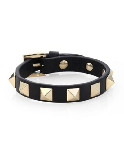 Shop Valentino Rockstud Leather Bracelet In Black Gold