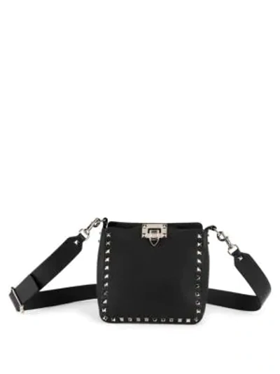 Shop Valentino Mini Rockstud Leather Hobo Bag In Black