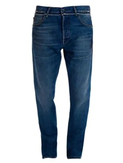 Shop Valentino Distressed Slim-straight Fit Rockstud Jeans In Denim