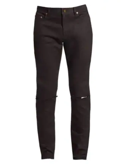 Shop Saint Laurent Distressed Skinny-fit Jeans In Black