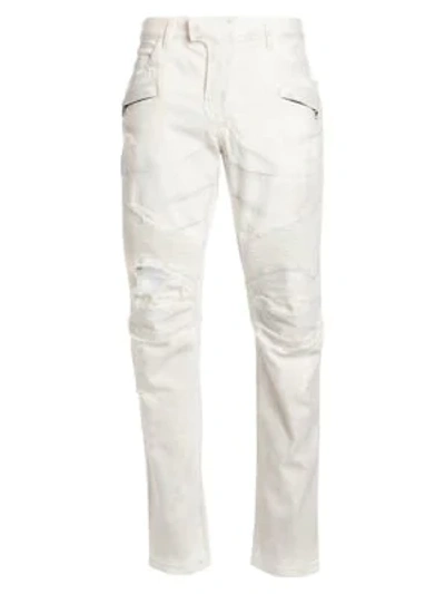 Shop Balmain Tapered Distressed Biker Jeans In White
