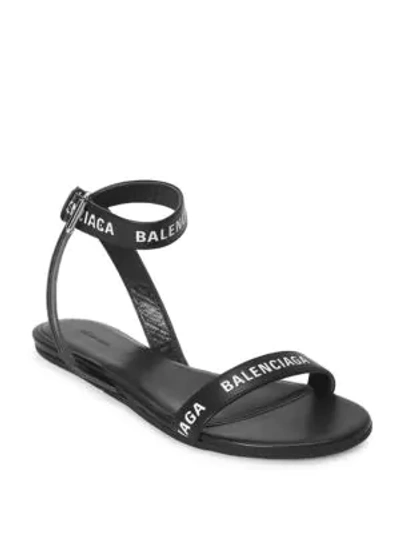 Shop Balenciaga Logo-print Leather Flat Sandals In Black