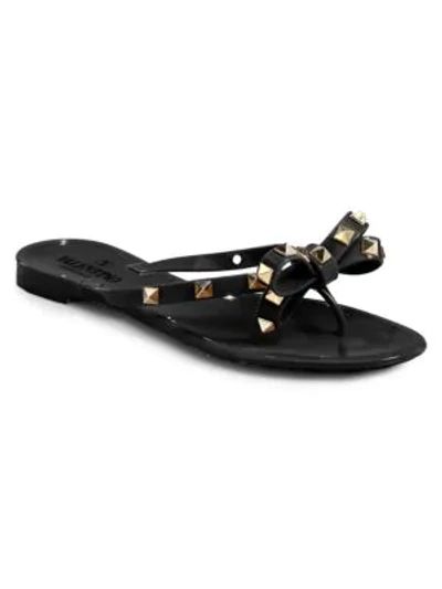 Shop Valentino Women's Rockstud Bow Jelly Thong Sandals In Black