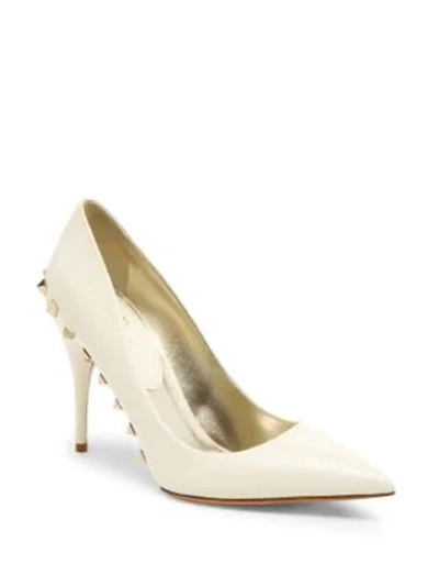 Shop Valentino Jaw Studs Point Toe Pumps In Ivory