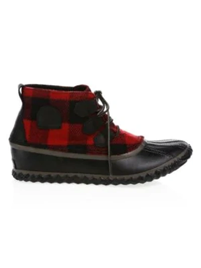 Shop Sorel Out & About Leather Booties In Black