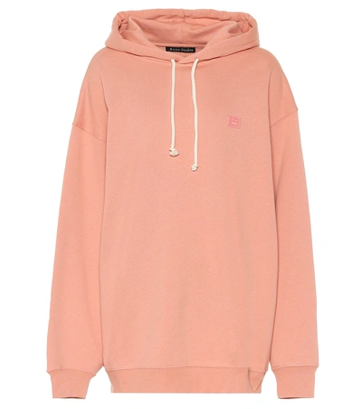 Shop Acne Studios Face Oversized Cotton Hoodie In Pink