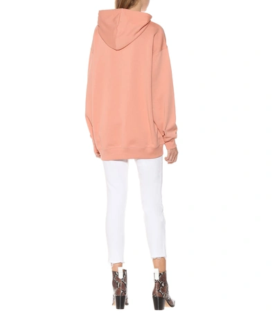 Shop Acne Studios Face Oversized Cotton Hoodie In Pink