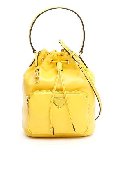 Shop Prada Mini Bucket Bag In Sole|giallo