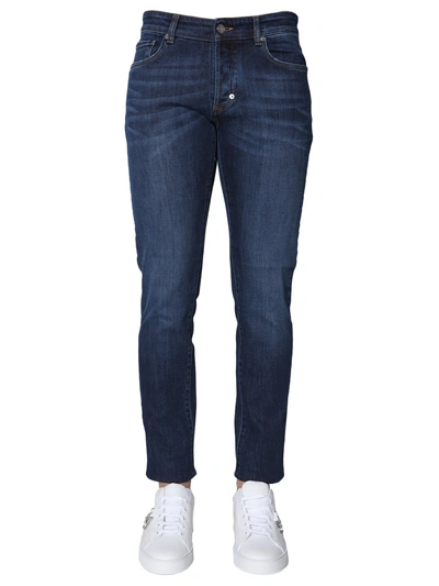 Shop Versace New Fit Jeans In Blu