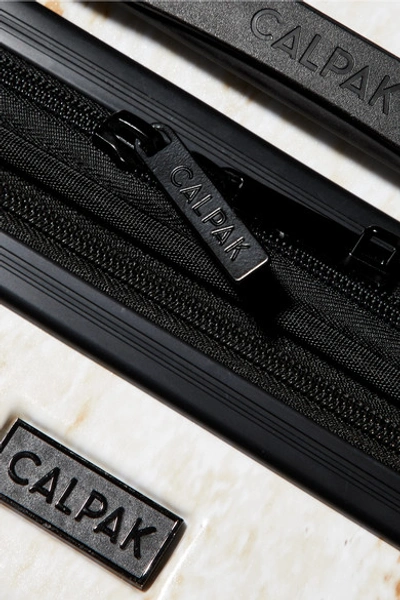 Shop Calpak Metallic Marbled Hardshell Suitcase In Gold