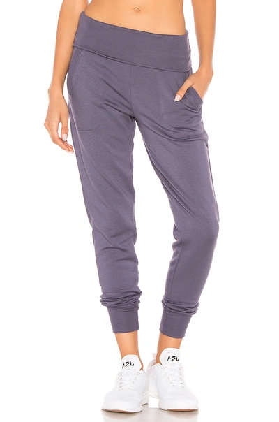 Shop Beyond Yoga Cozy Fleece Foldover Sweatpant In Purple