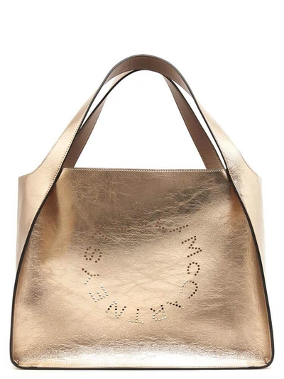 Shop Stella Mccartney Metallic Logo Tote Bag In Gold