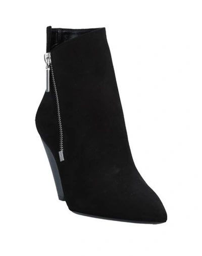 Shop Saint Laurent Ankle Boot In Black