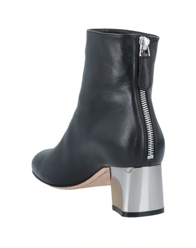 Shop Alexander Mcqueen Ankle Boot In Black