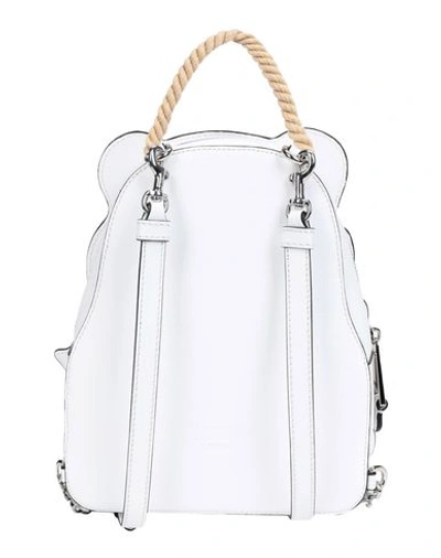 Shop Moschino Backpacks & Fanny Packs In White