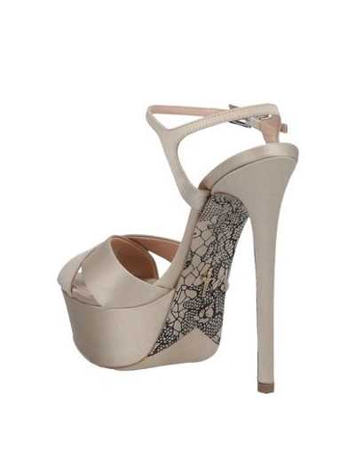 Shop Cesare Paciotti Sandals In Beige