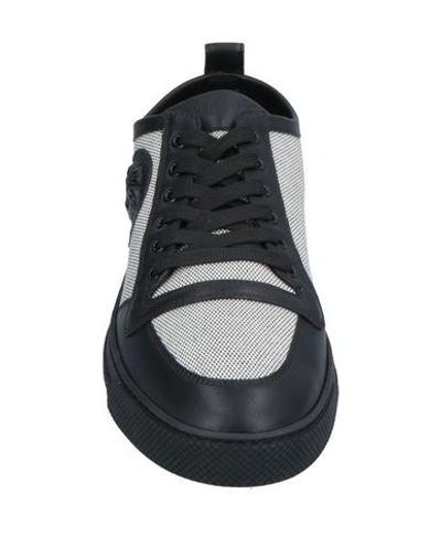 Shop Versace Sneakers In Black