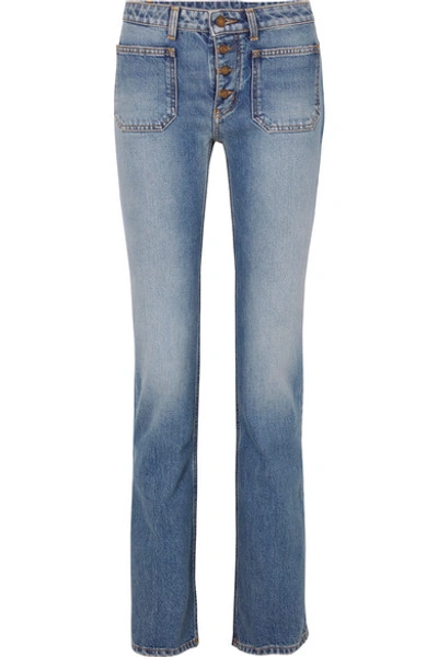 Shop Saint Laurent Low-rise Flared Jeans In Indigo