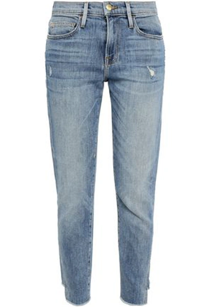 Shop Frame Cropped Distressed Boyfriend Jeans In Light Denim