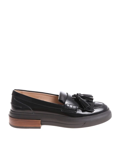 Shop Tod's Tassel Detail Loafers In Basic