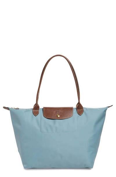 Shop Longchamp Large Le Pliage Tote - Blue In Artico