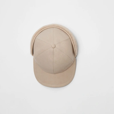 Shop Burberry Leather And Shearling Cap In Limestone