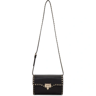 Shop Valentino Black  Garavani Medium Rockstud Flap Bag In 0no Black