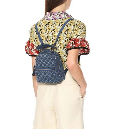 Shop Valentino Rockstud Spike Mini Denim Backpack In Blue