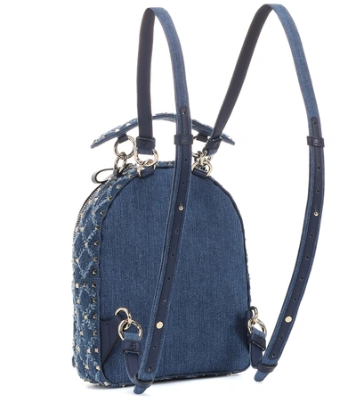 Shop Valentino Rockstud Spike Mini Denim Backpack In Blue