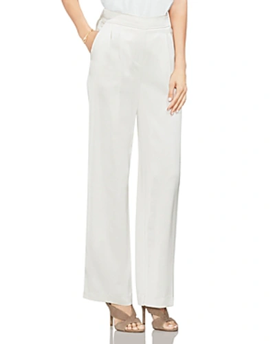 Shop Vince Camuto Satin Pleat-front Wide-leg Pants In Pearl Ivory