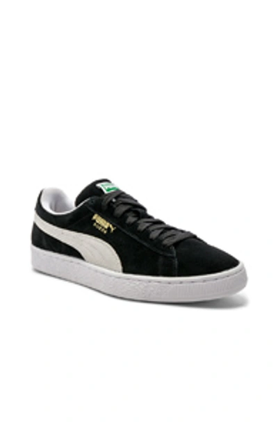 Shop Puma Suede Classic In Black & White