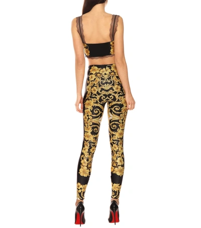 Shop Versace Printed Leggings In Gold